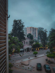 Calm, neutral-toned photo of a quiet residential street in Kuala Lumpur