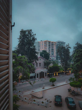 Calm, neutral-toned photo of a quiet residential street in Kuala Lumpur