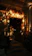 A warm, inviting shop interior with neatly arranged specialty products and friendly staff.
