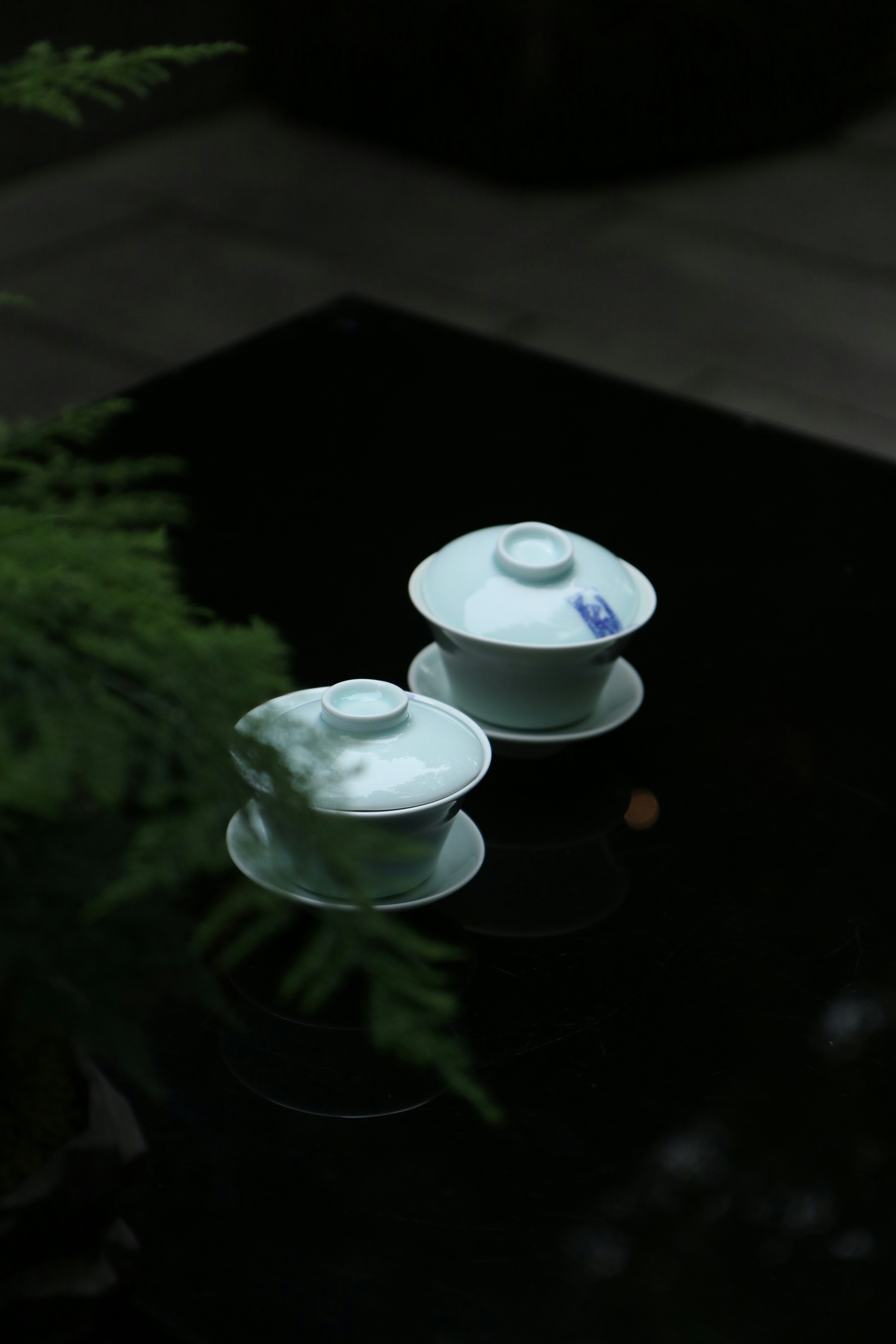 a couple of white bowls sitting on top of a table