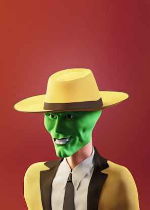 A cartoonish character with a bright green face wearing a large yellow hat and a matching yellow suit with a black trim. The background is a gradient of warm red tones, and the character displays a mischievous smile.