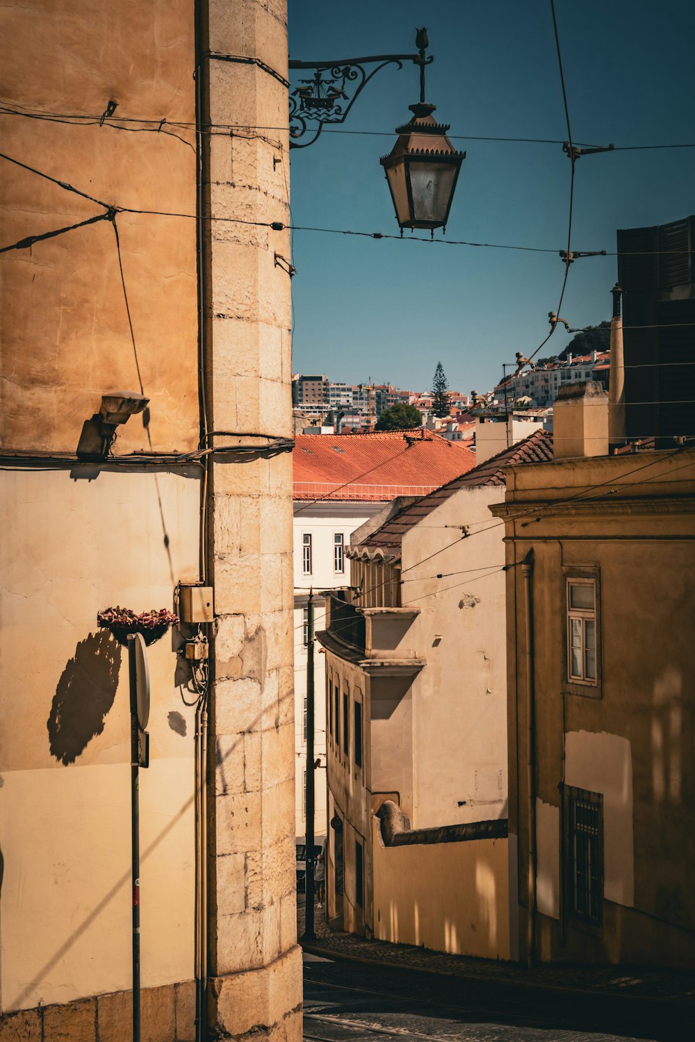 a street light hanging over a city street