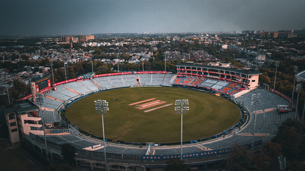 an aerial view of a baseball field in a city