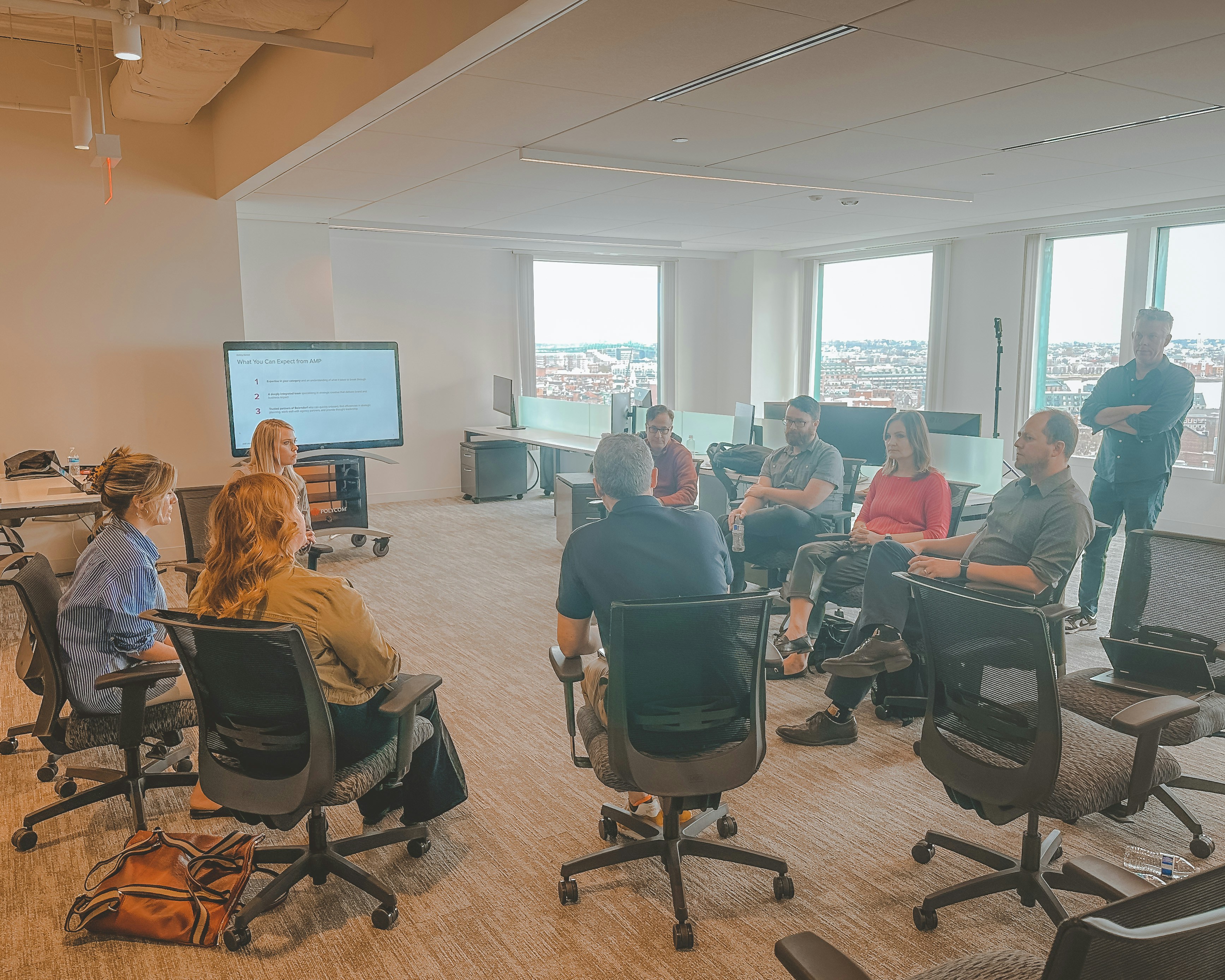 Support group meeting in a circle with natural lighting
