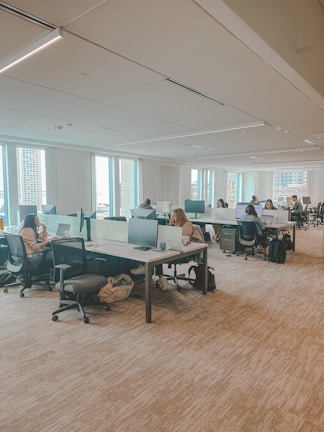 A professional cleaning team at work in an office environment.