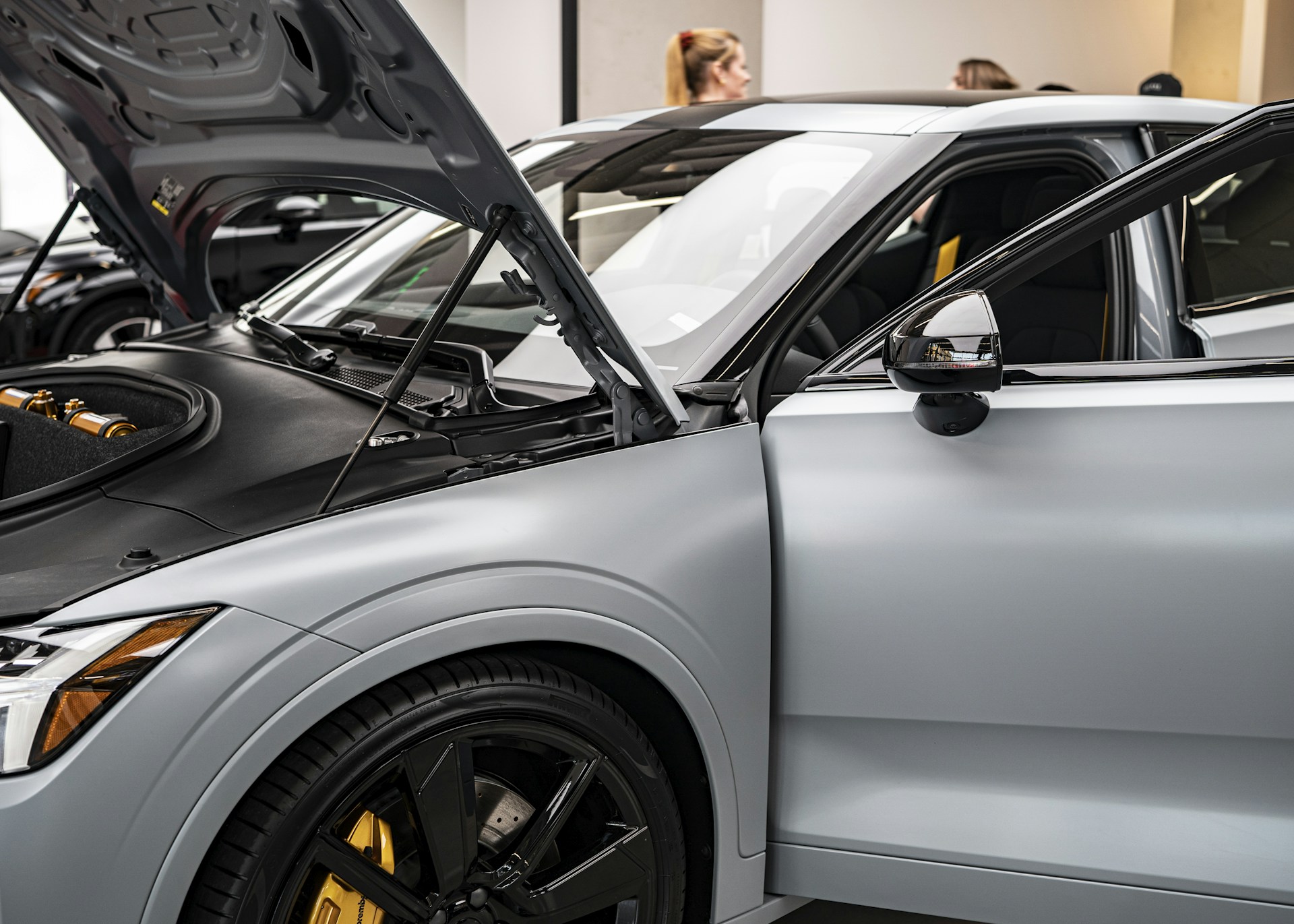 woman wearing yellow long-sleeved dress under white clouds and blue sky during daytime
