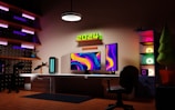 A futuristic workspace with glowing computer screens and neon accents.