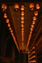 Elegant bamboo lanterns lined up along a hallway, creating a peaceful pathway.