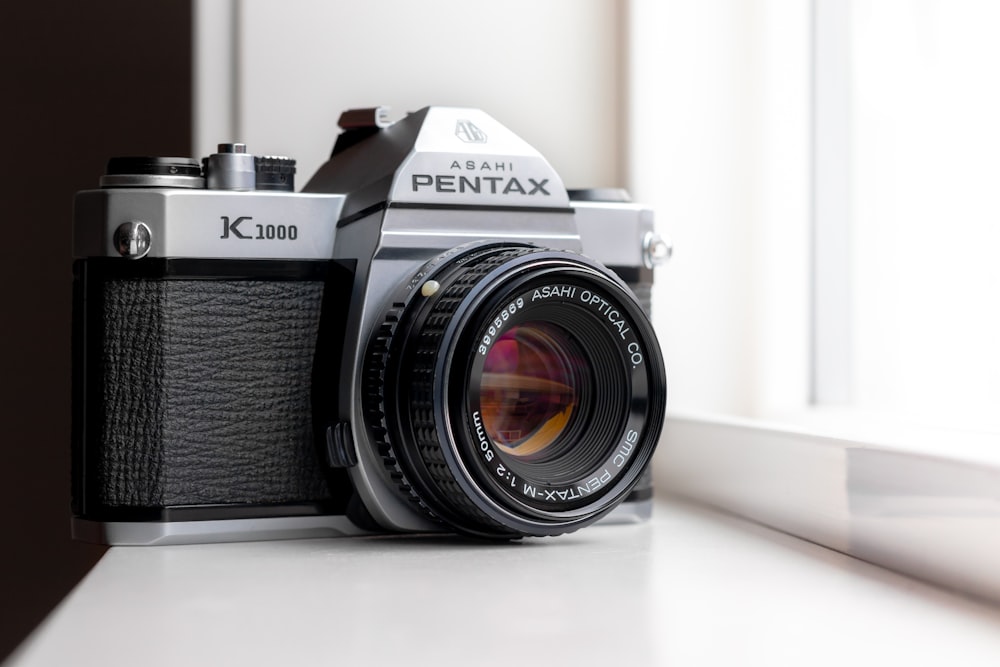 a close up of a camera on a window sill