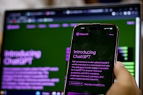 Close-up of a smartphone screen showing a voice-activated AI chatbot in action.