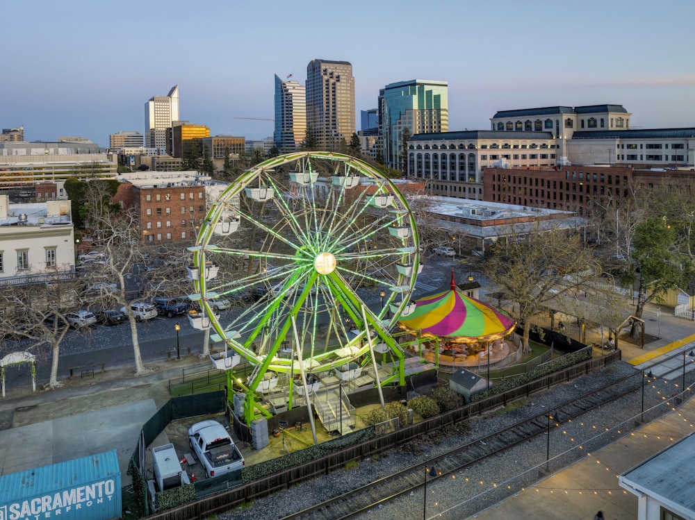 a ferris wheel in the middle of a city