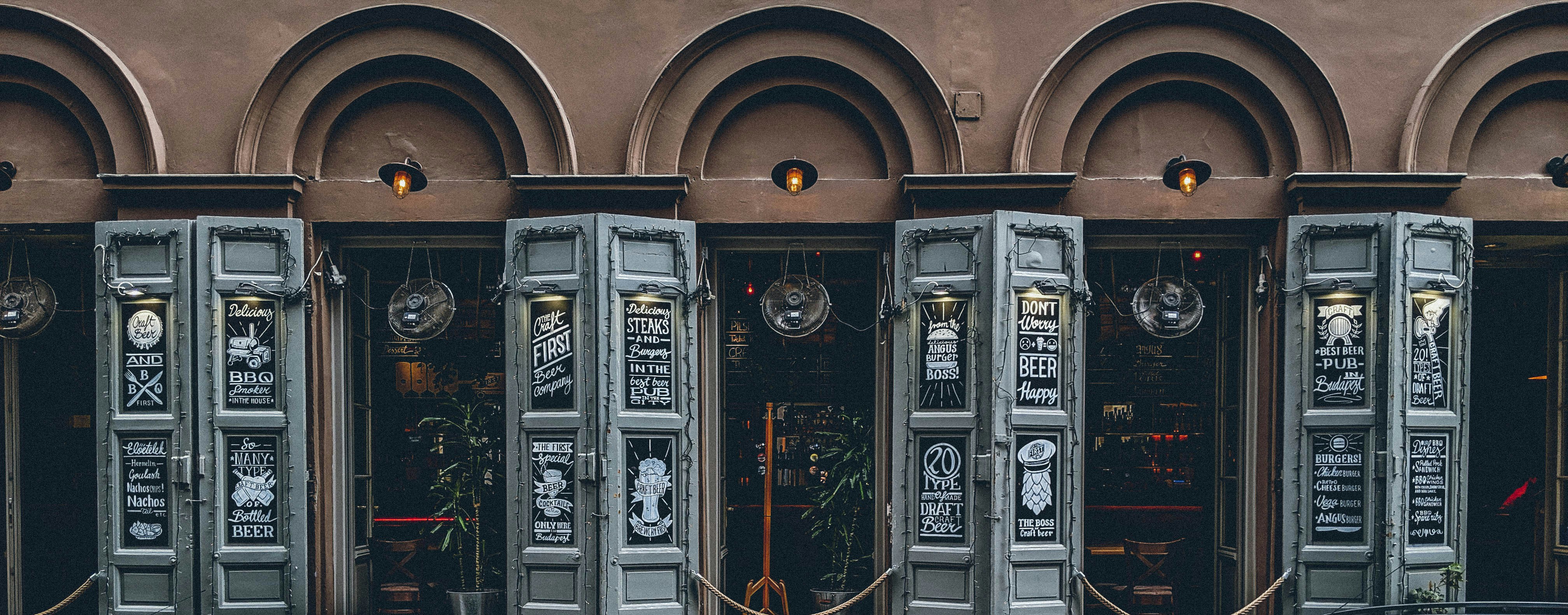 a row of metal doors sitting next to each other