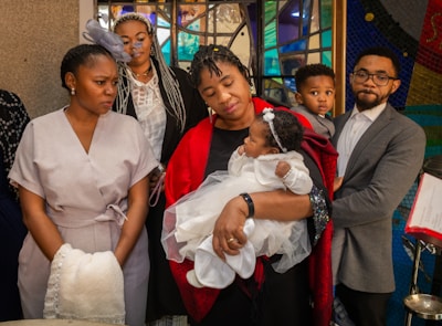 a group of people standing next to each other