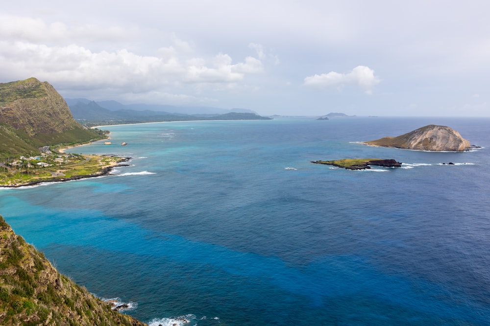 a scenic view of the ocean from a hill