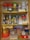 Neatly organized kitchen pantry with labeled storage boxes