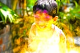 A vibrant children's party with face painting activities.
