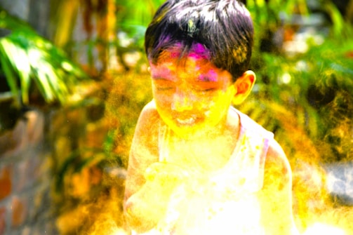 A vibrant children's party with face painting activities.