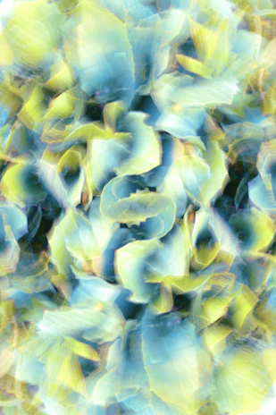 Abstract travel-themed shapes in soft blue and muted green on a white background.