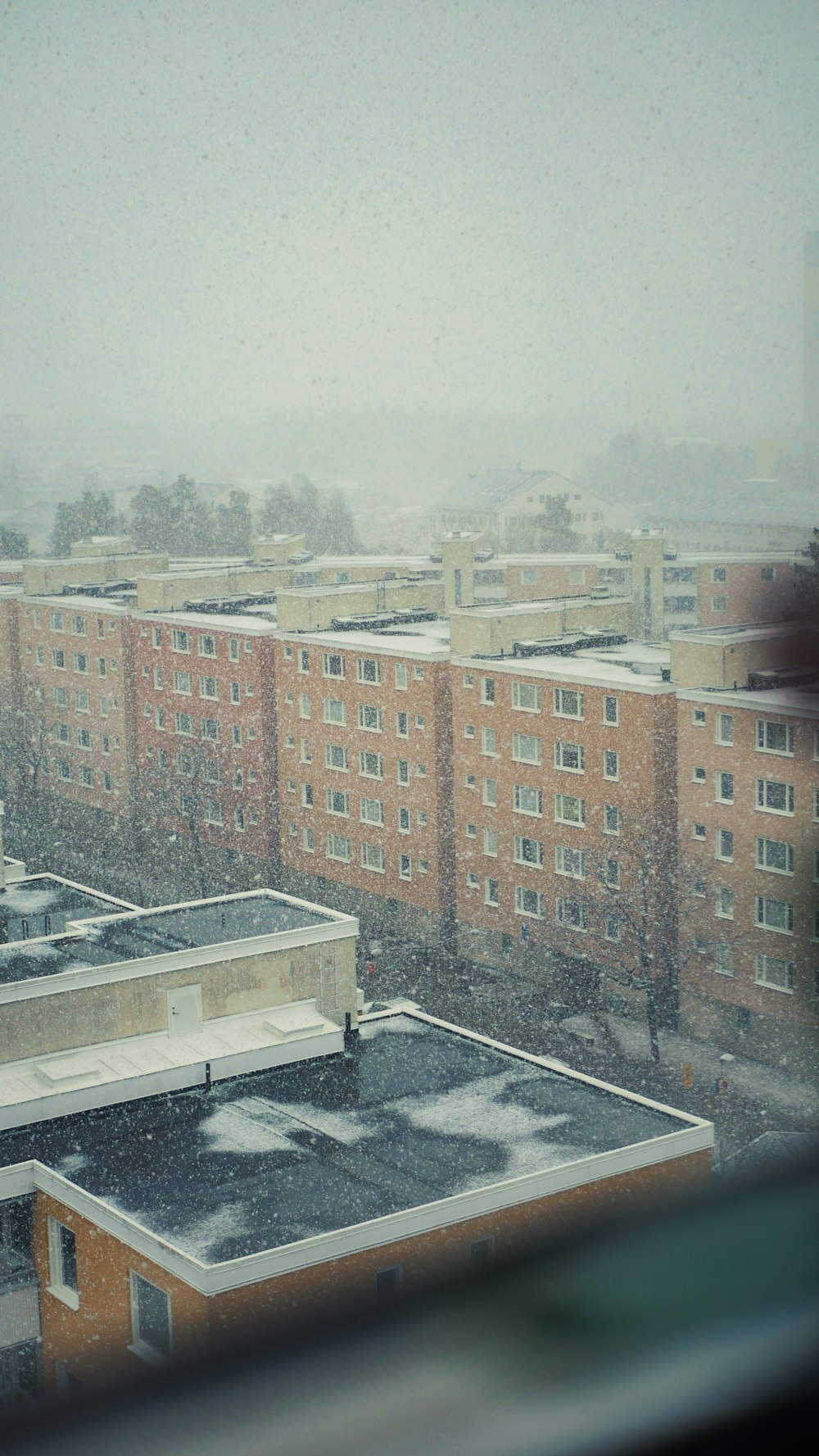 a view of a city from a window of a building