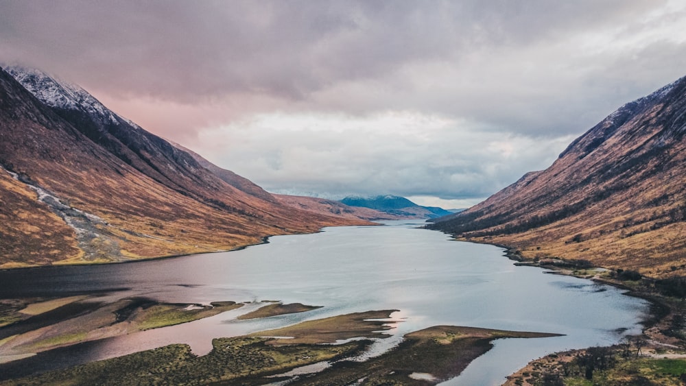 a large body of water surrounded by mountains