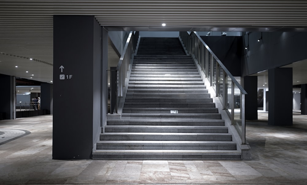 a set of stairs leading up to an elevator