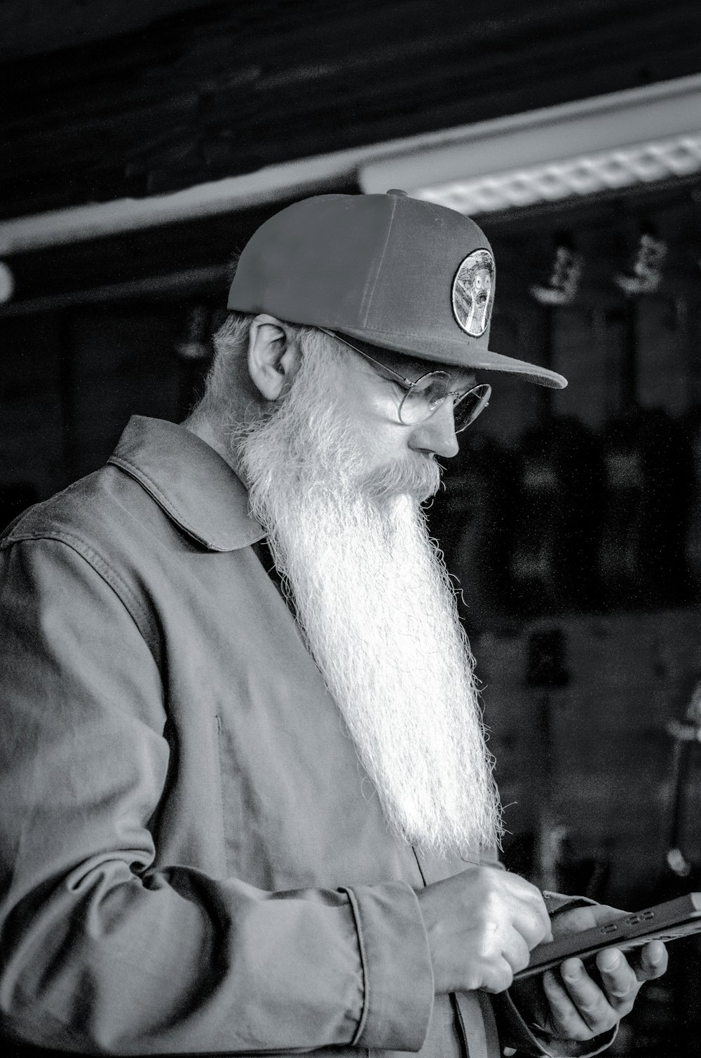 a man with a long white beard wearing a hat