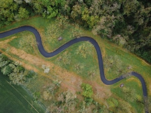 Cover of the book 'From Here to There' featuring a winding path through a vibrant landscape.