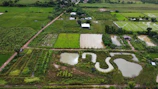 Aerial view of a rural landscape with marked survey points.