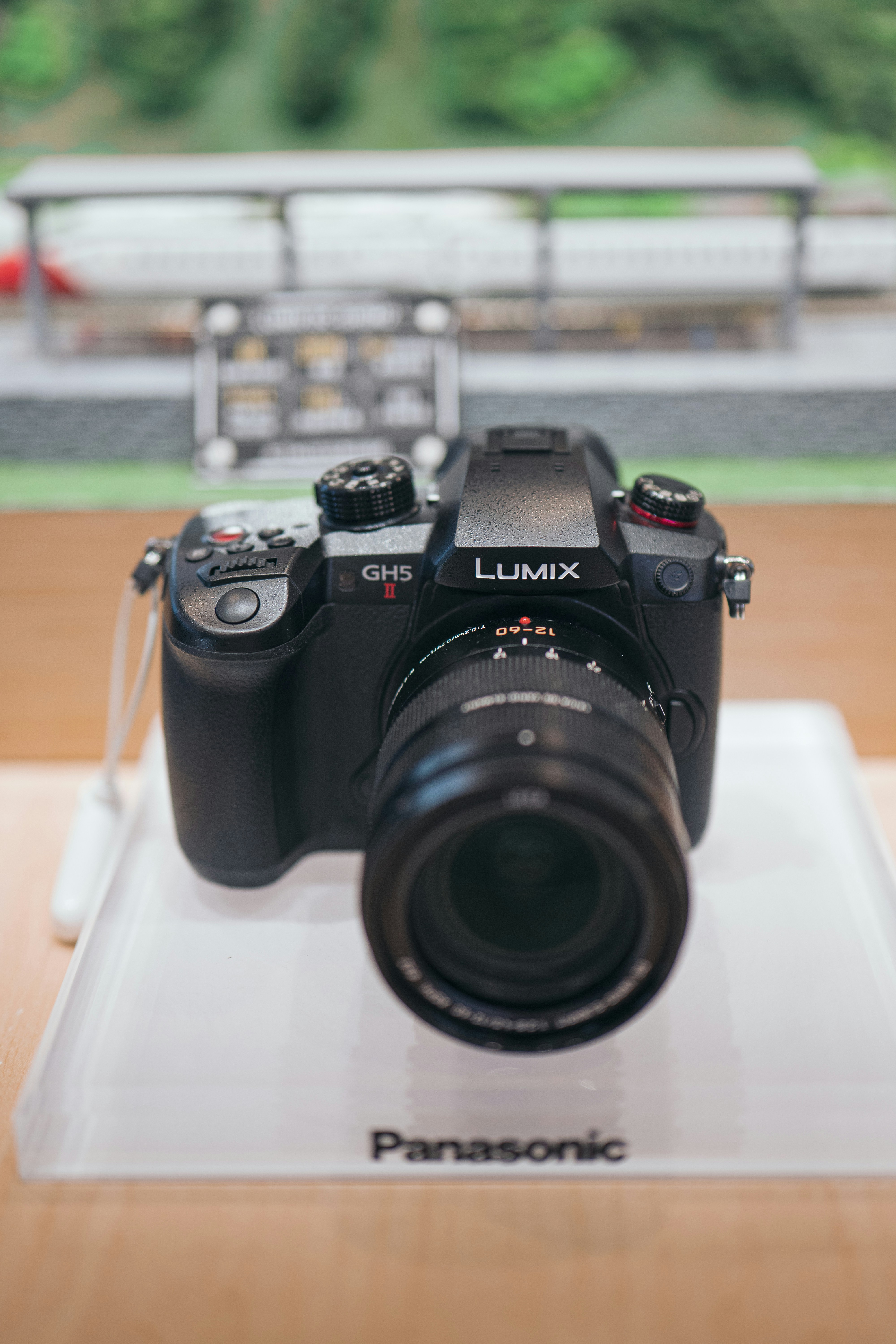 a camera sitting on top of a white plate