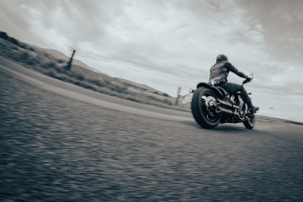 a person riding a motorcycle on a road