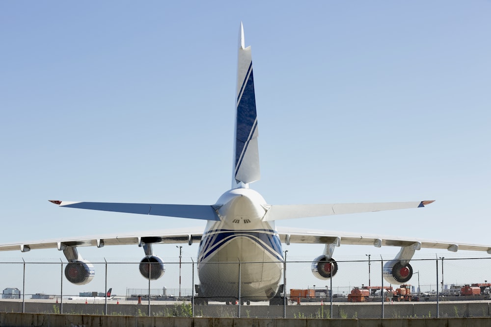 a large jetliner sitting on top of an airport tarmac