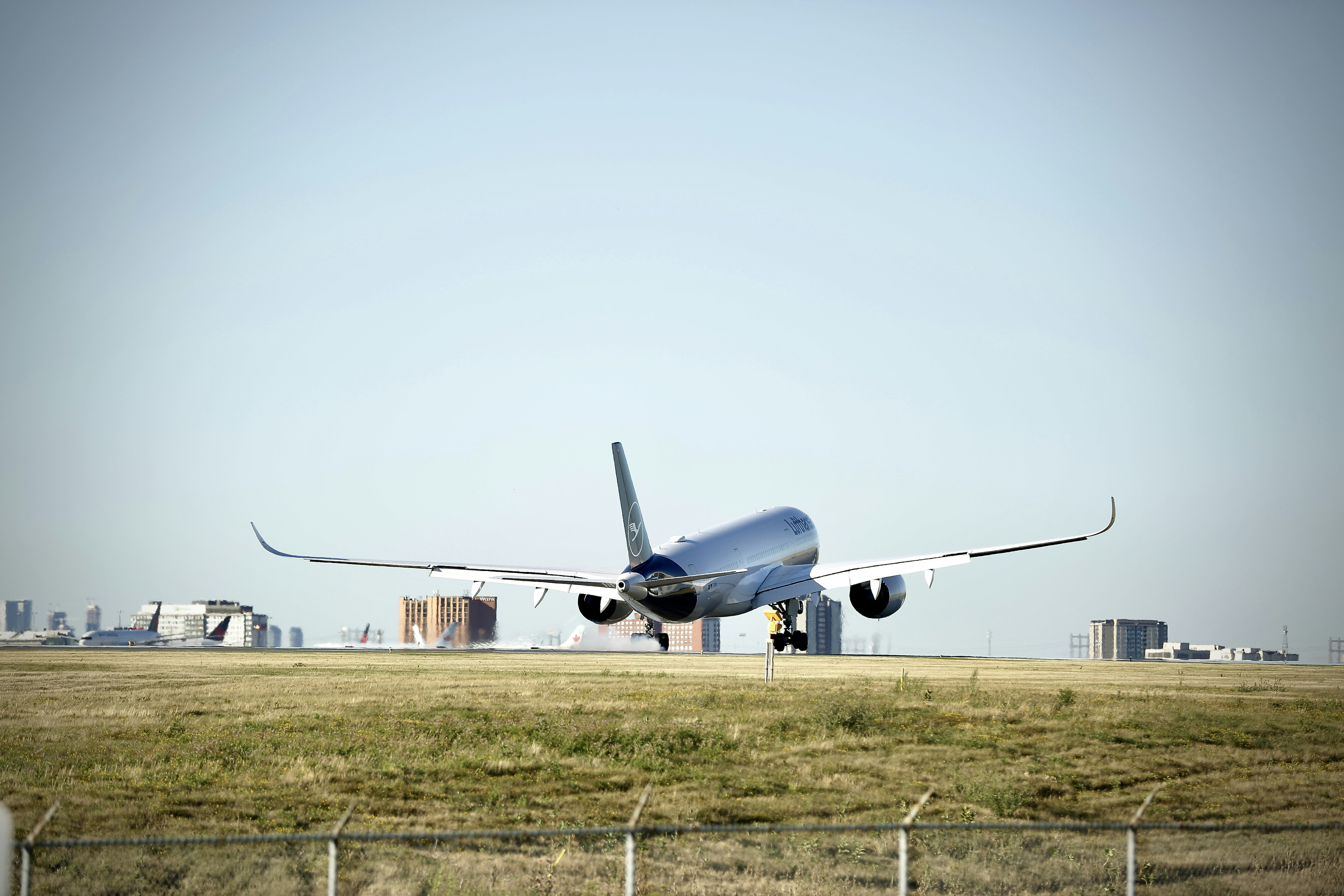 a large jetliner taking off from an airport runway