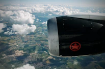 An aerial view of Ottawa with a subtle overlay of flight paths connecting influencers to brands.