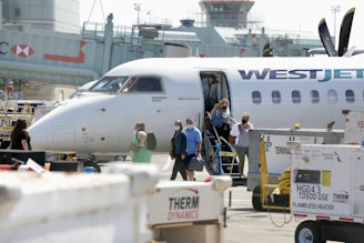 Happy passengers arriving at their destination smiling.