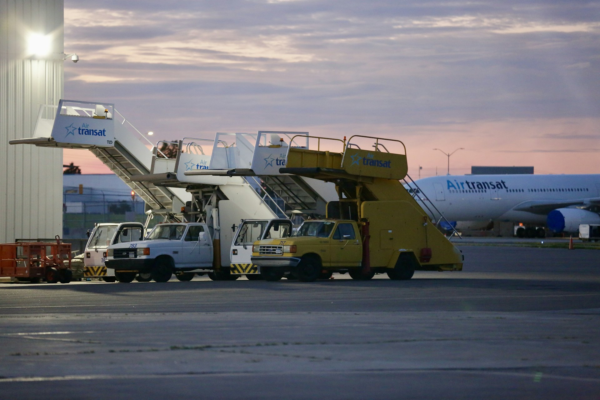 a large jetliner sitting on top of an airport tarmac