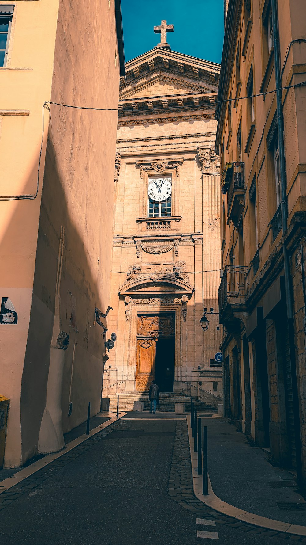 a church with a cross on the top of it