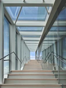 a set of stairs leading up to a skylight