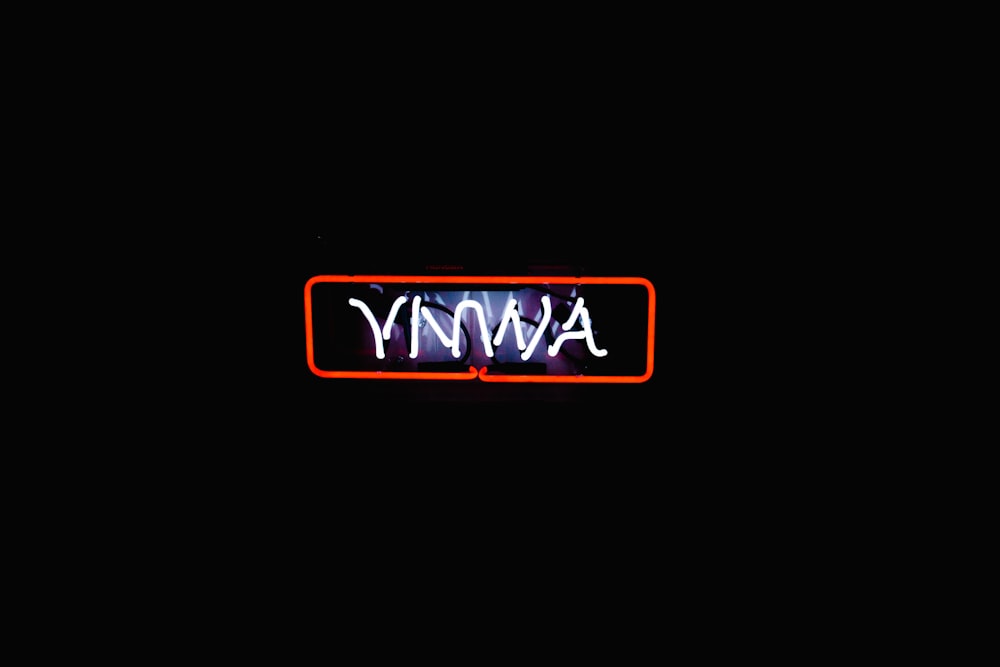 a neon sign that says awny on it