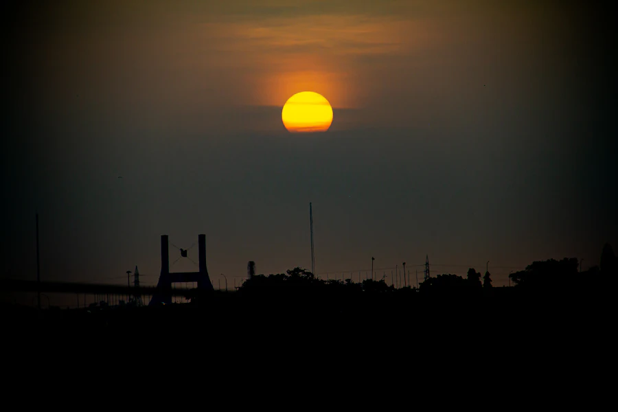 The sun setting over the City Gate in Abuja