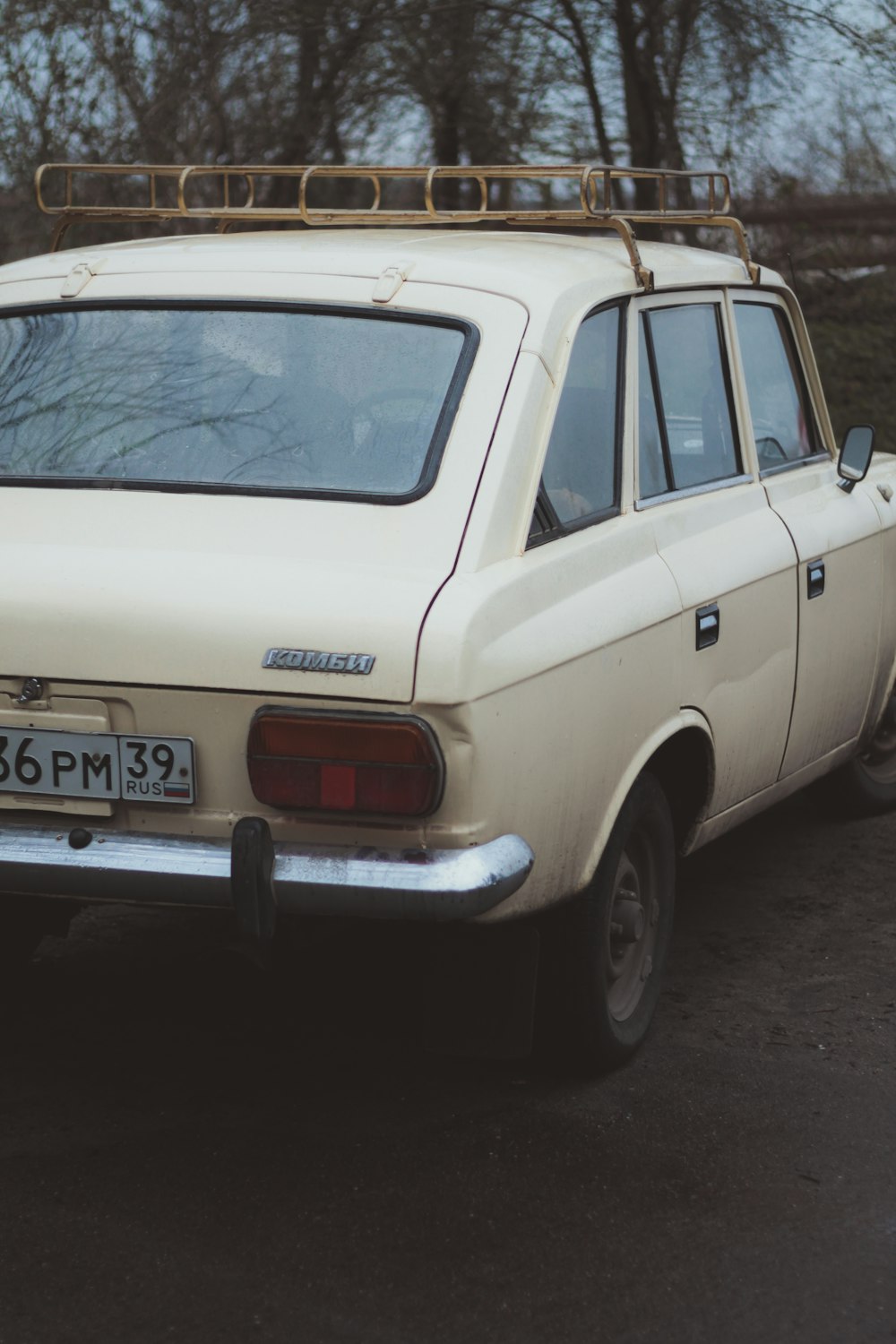 a white car parked on the side of the road