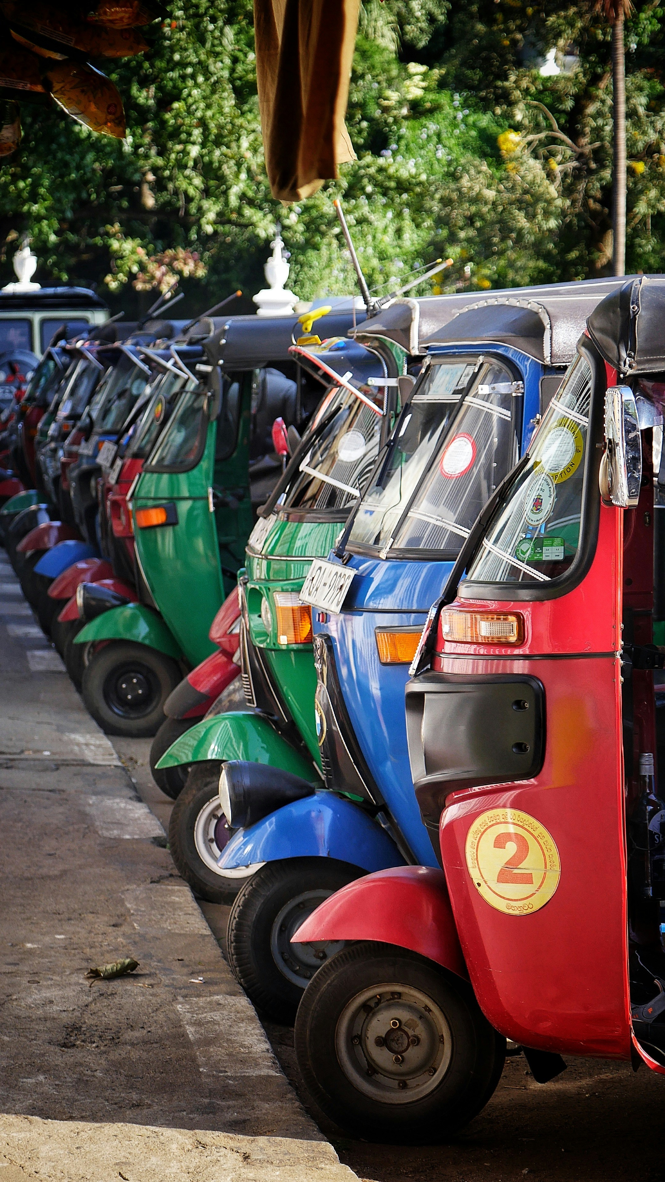 Tuk-tuk navigating busy traffic
