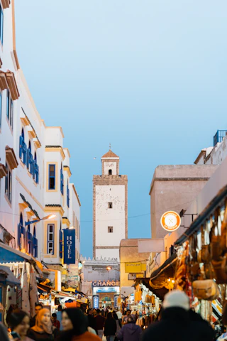Colorful Moroccan street scene illustrating everyday Darija conversations.
