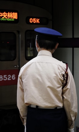 Certified driver in uniform checking cargo before departure