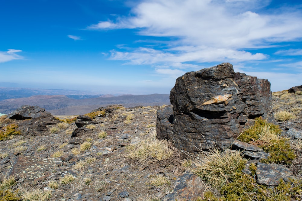 a rock outcropping on top of a mountain