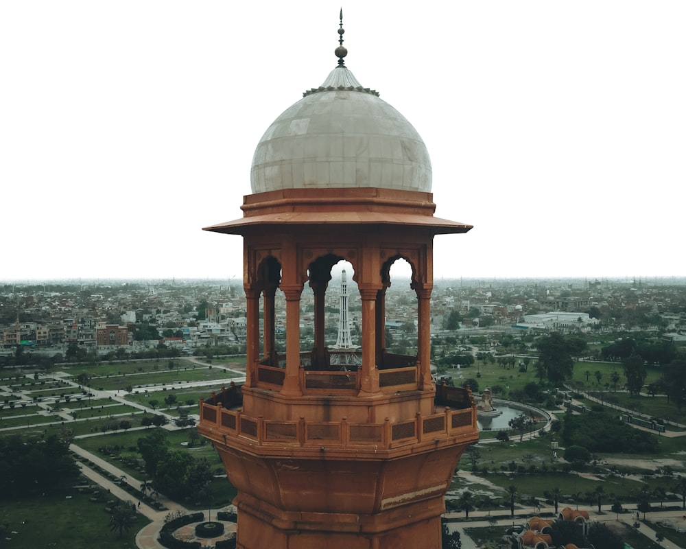 a tall tower with a dome on top of it