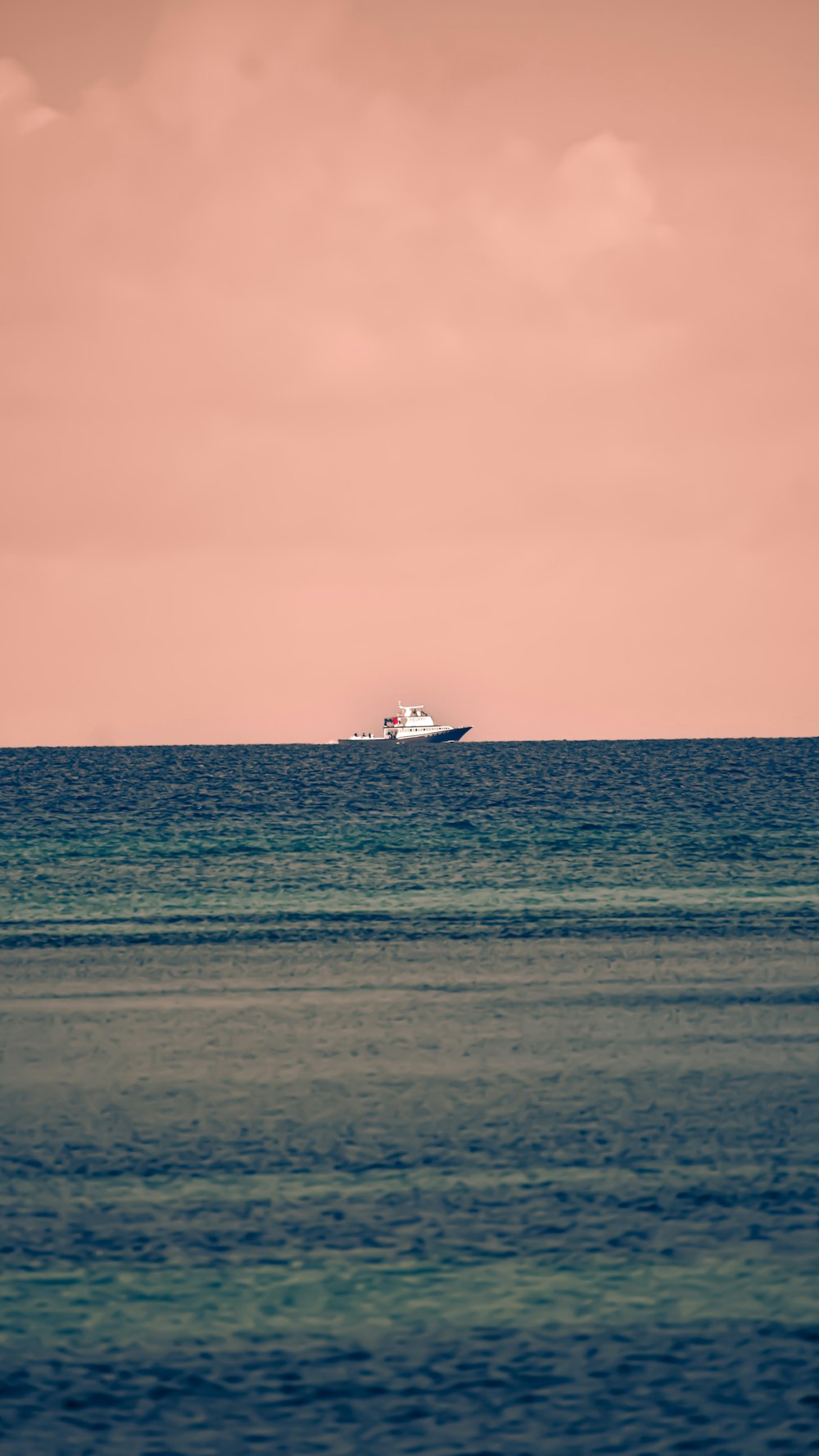 a large boat in the middle of the ocean