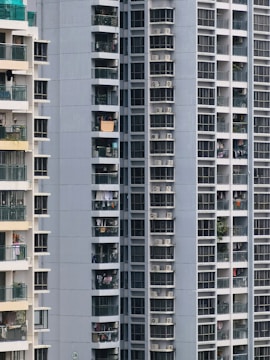 Close-up of a luxury apartment balcony overlooking the city.