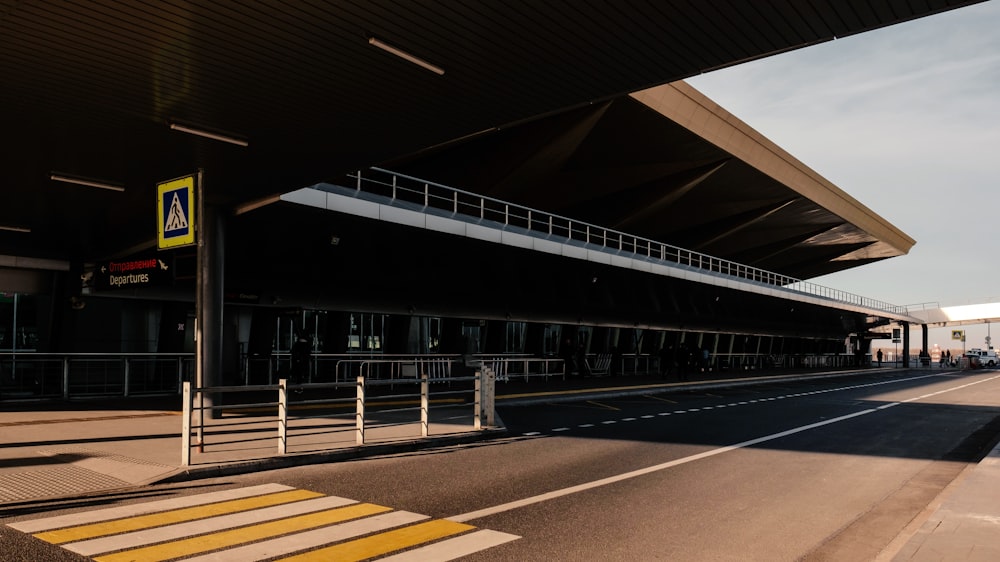 an empty parking lot next to an airport