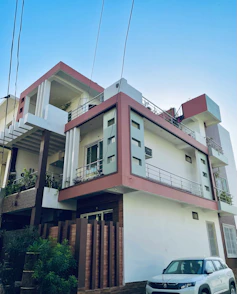 a car is parked in front of a building