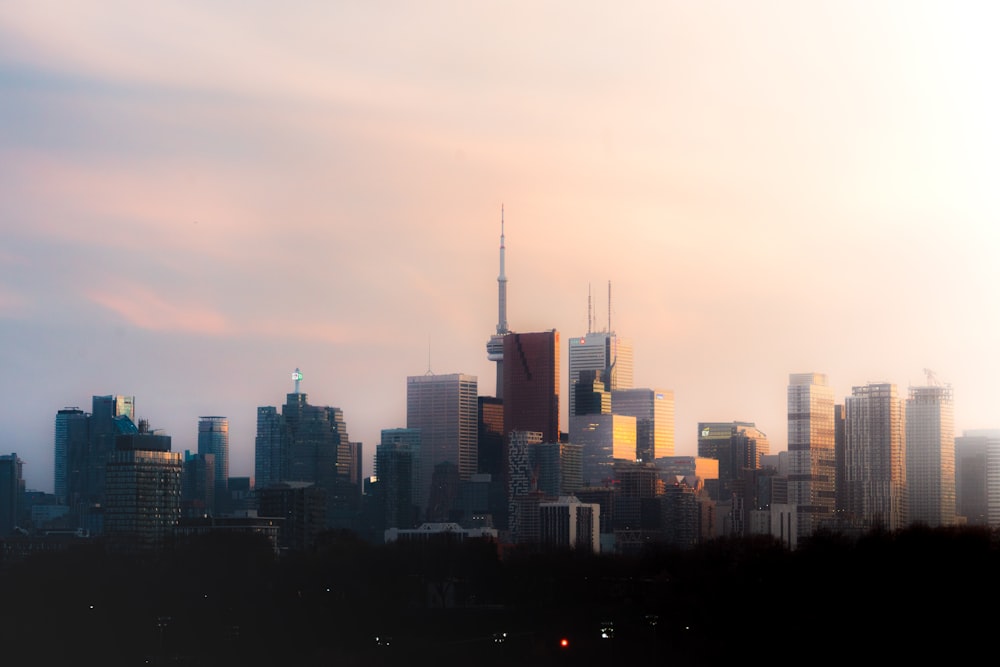 a view of a city skyline with tall buildings